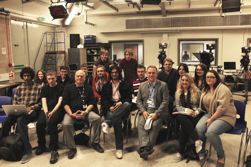 Award winning filmmaker Khurrum M.Sultan with Media lecturer Phil Middleham (L) and Curriculum Area Manager Simon O’Grady (R) and a group of media studies students.