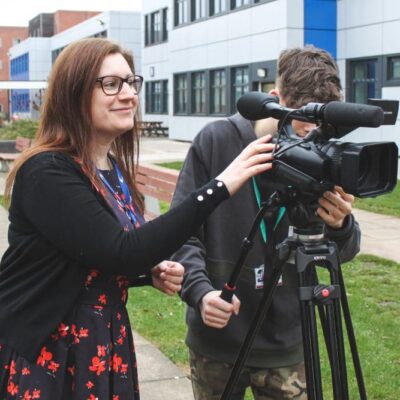 Sarah Downing helping students with filming