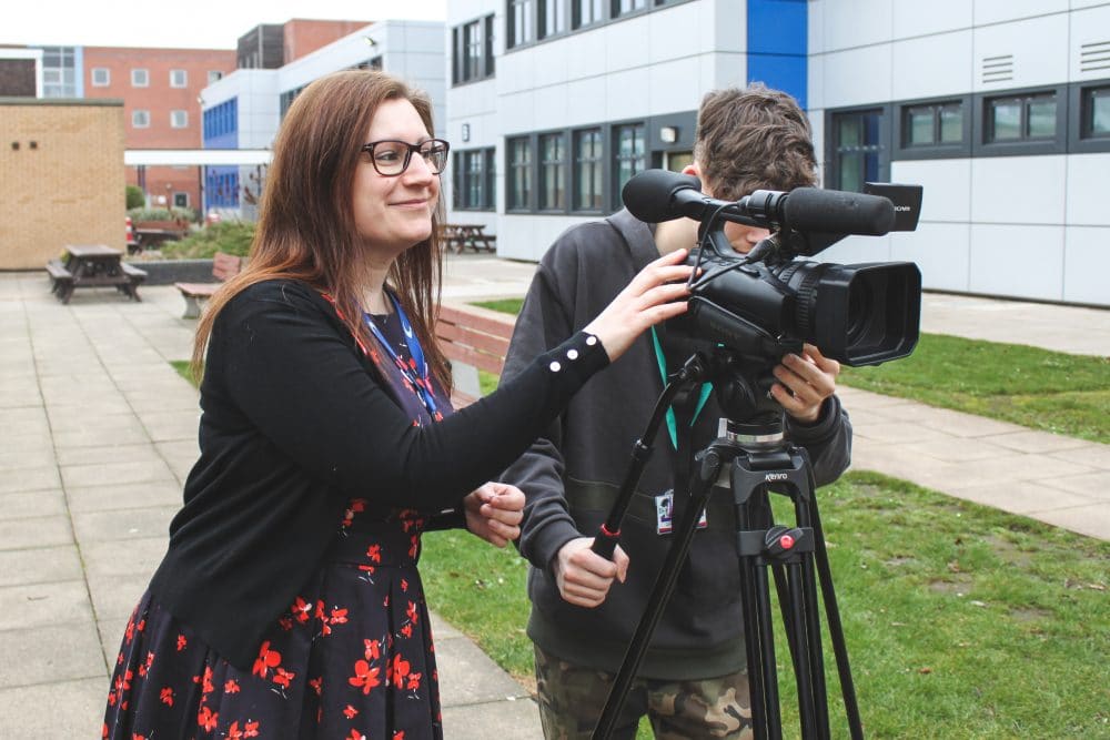 Sarah Downing helping students with filming