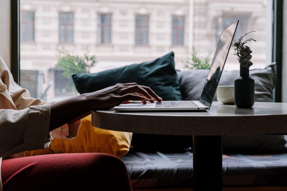 Woman typing on laptop