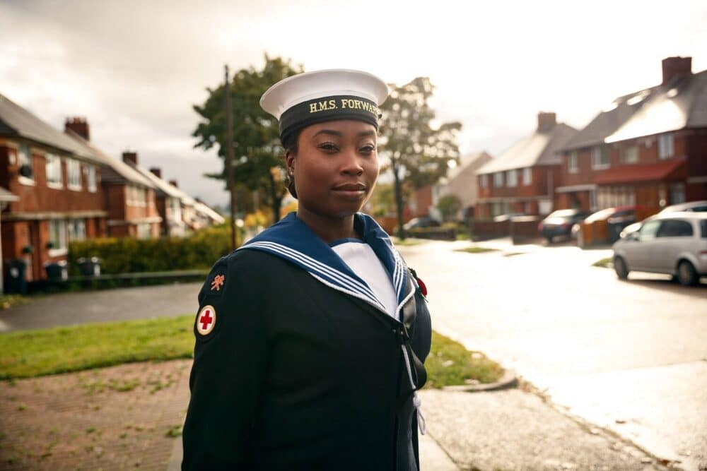 Nicole in Navy Uniform with hands behind back