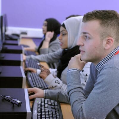 Students looking at computers at stratford-upon