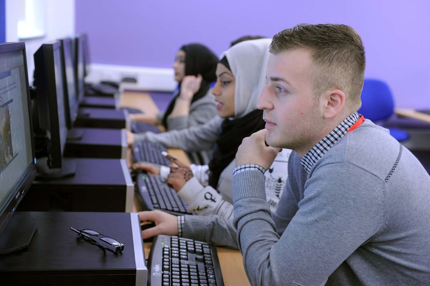 Students looking at computers at stratford-upon