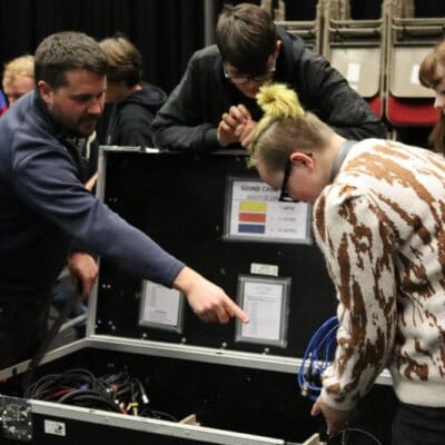 John Campbell with flight case at stratford-upon-avon college