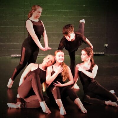 Dancing group pose by performing arts students at Stratford-upon-avon College