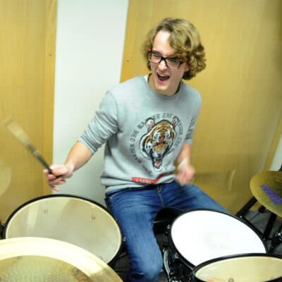 Music student on the drums