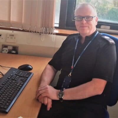 Andy Wardlow at his desk at Stratford-upon-Avon College