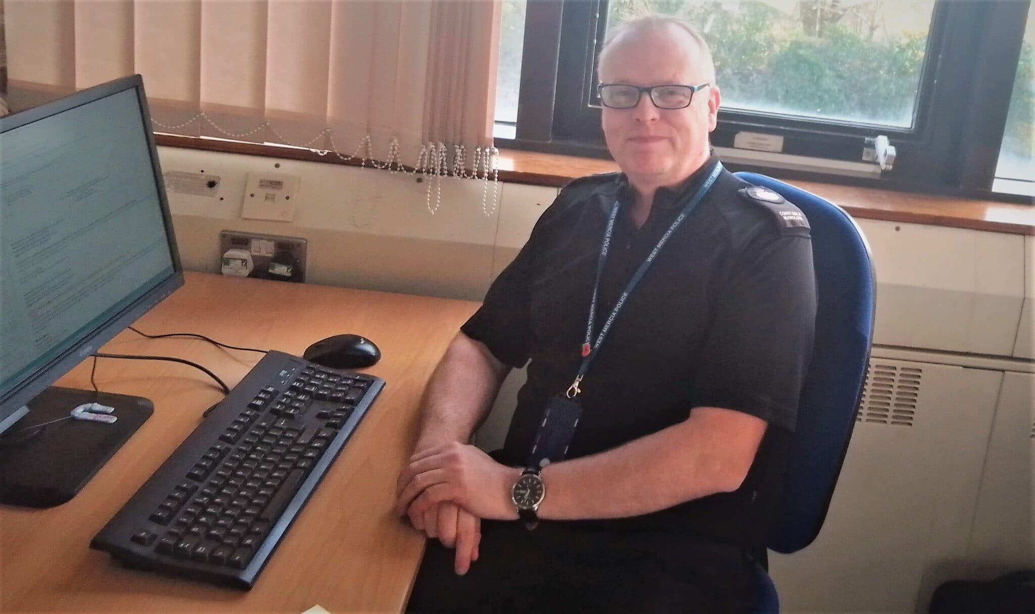 Andy Wardlow at his desk at Stratford-upon-Avon College