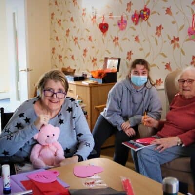 Chloe, Leanne and Donna with residents