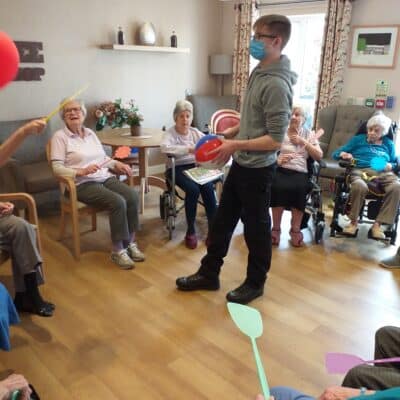 Luke Barry interacting with residents