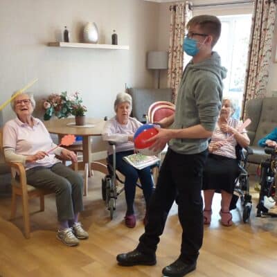 Luke barry interacting with residents