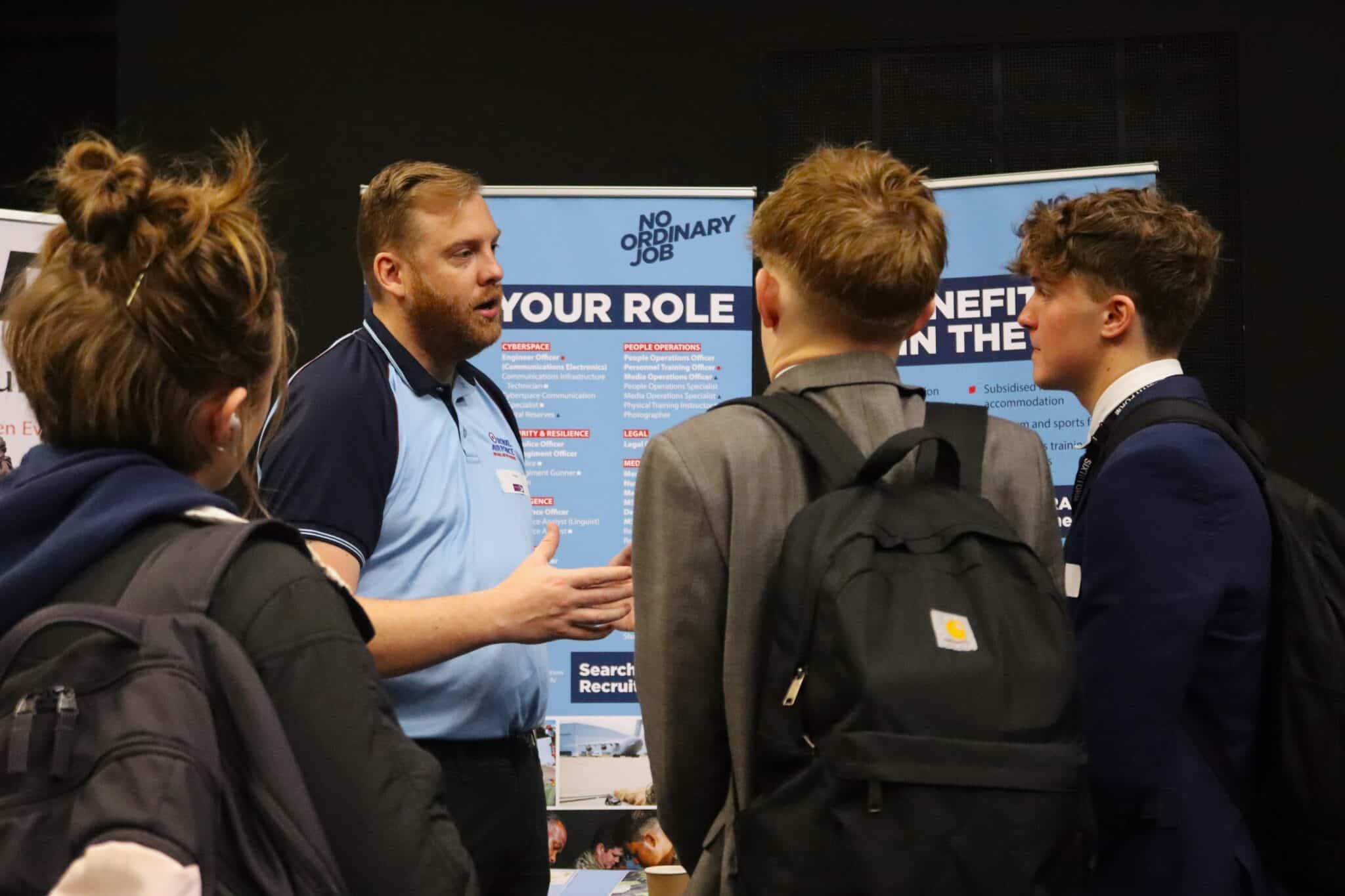 An RAF careers advisor talking to students