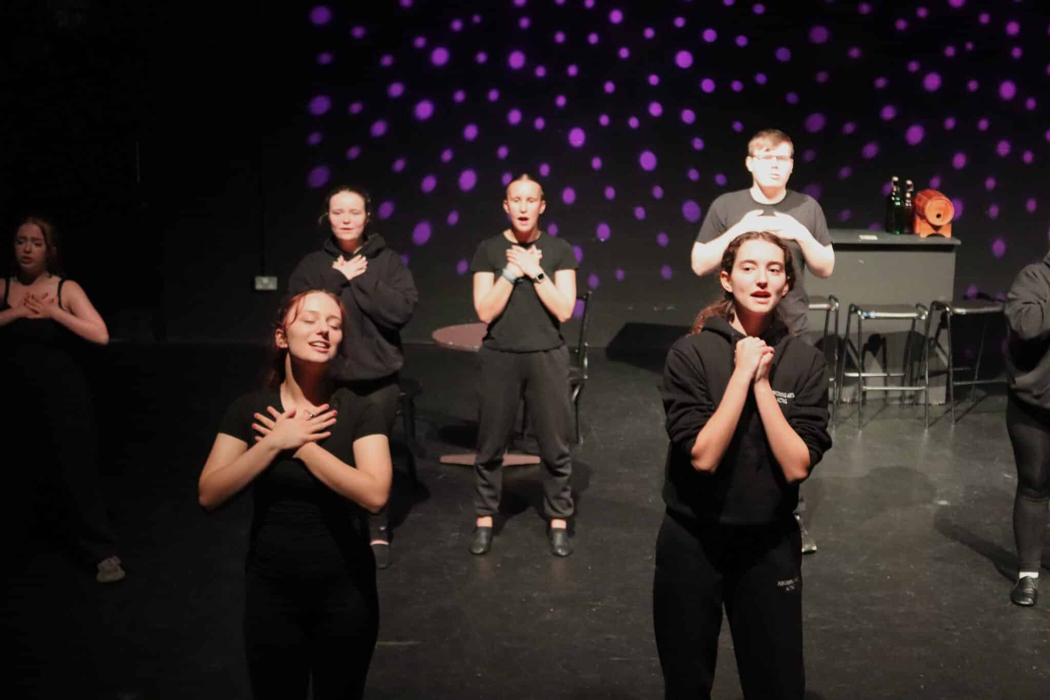 Stratford College Students performing a song number