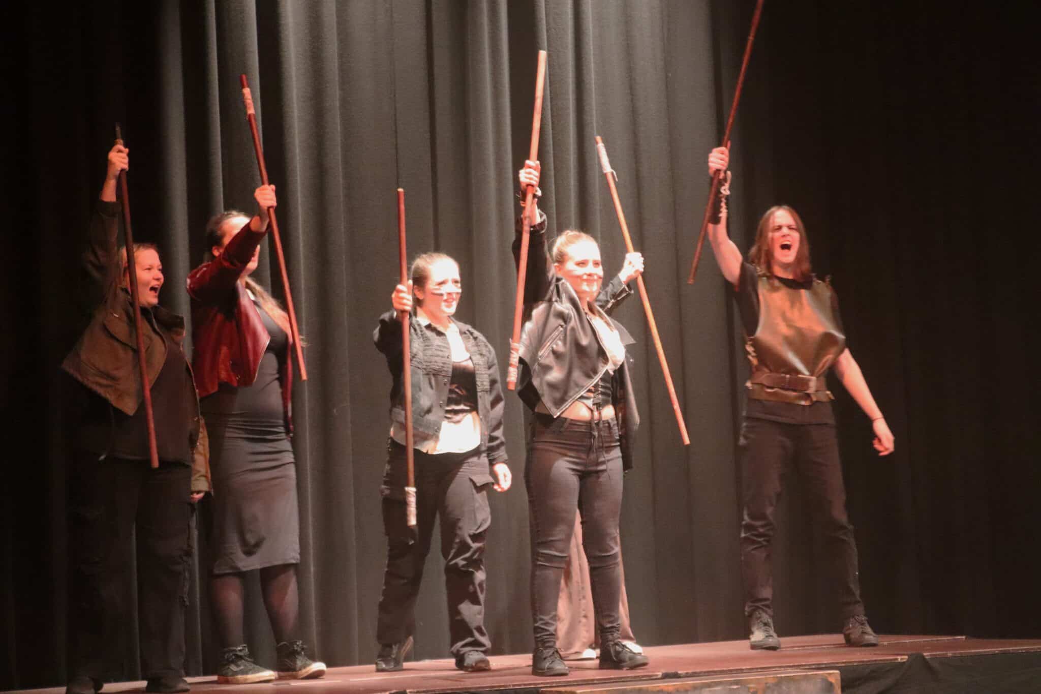 Stratford College Actors cheering on stage