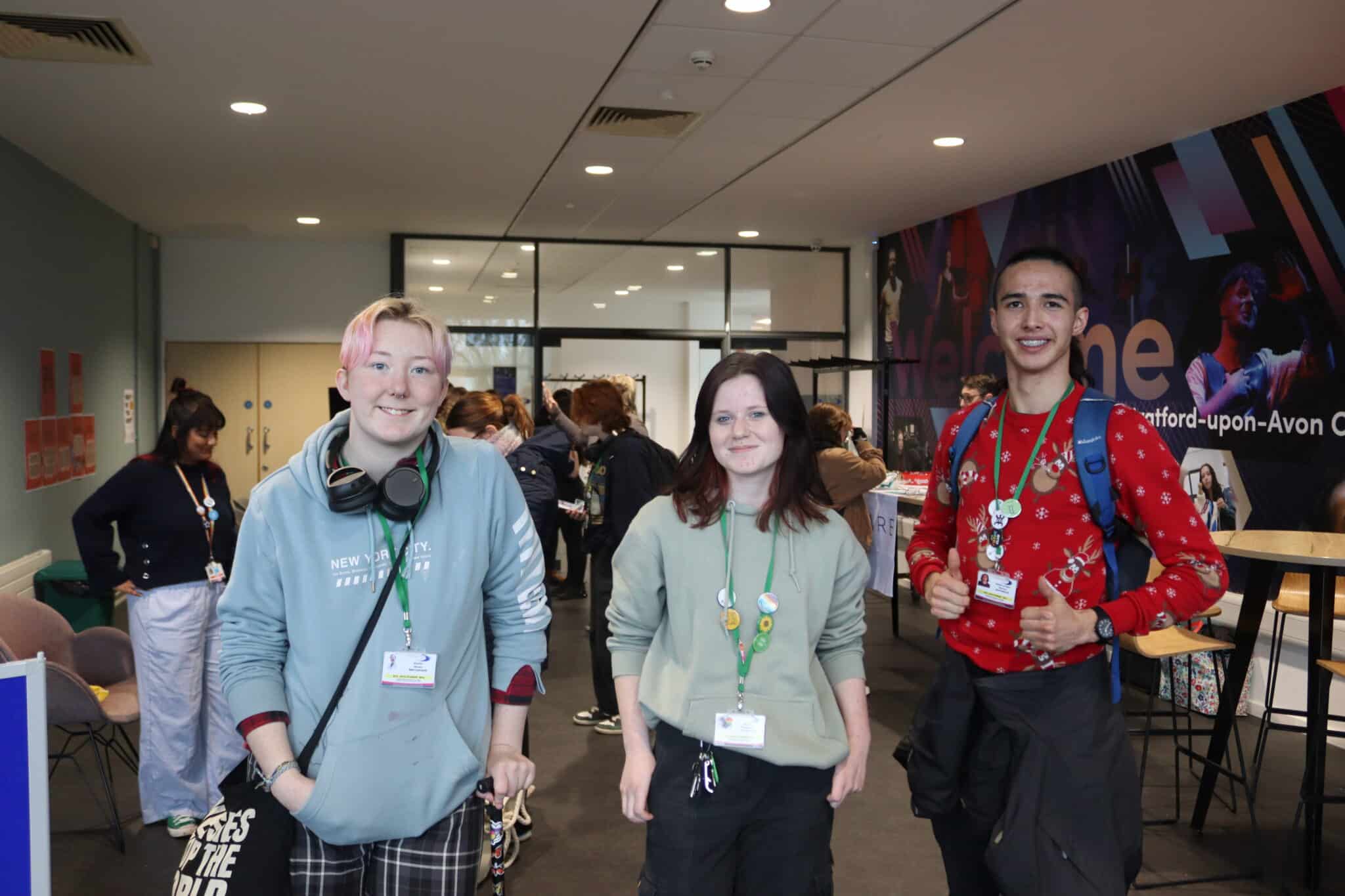 3 students smiling for a picture